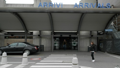 Arrivals doors at the Florence Italy Amerigo Vespucci airport, aka Peretola