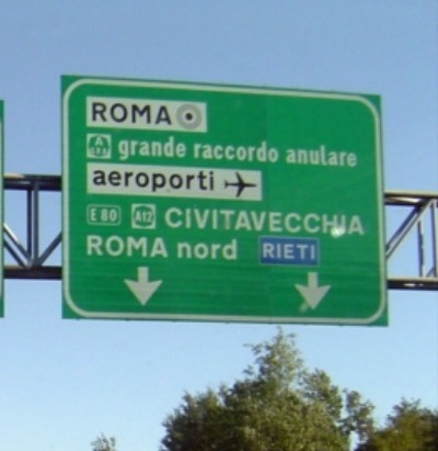 A green sign on the Autostrada