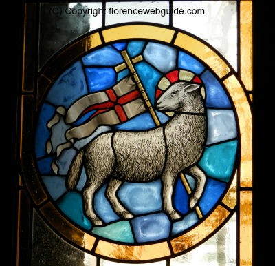 Stained glass window showing the Holy Lamb in the basilica
