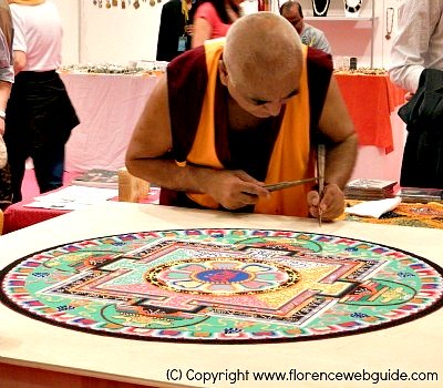 Tibetan art of sand mandala at the Art Fair in Florence