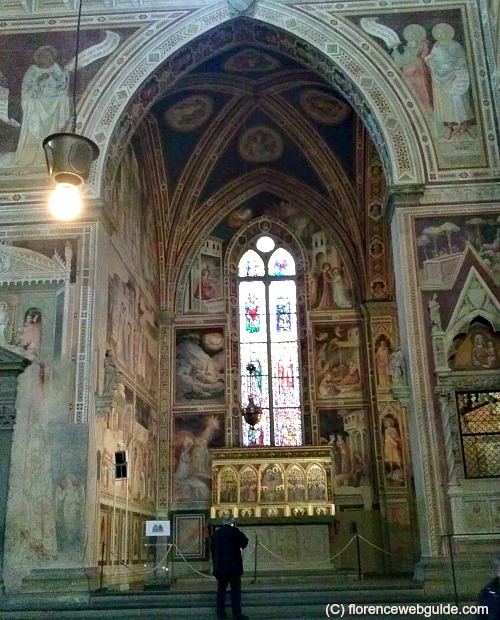 A private chapel decorated with frescoes and stained glass windows