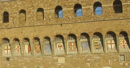 Series of 9 coats of arms running across Palazzo Vecchio Florence