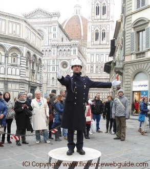 Traffic cop directs vintage cars at annual Befana car show