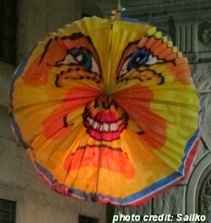 a paper lantern on a stick for Rificolona fest