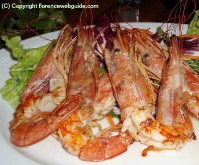 Grilled jumbo shrimp at a Florence fish restaurant