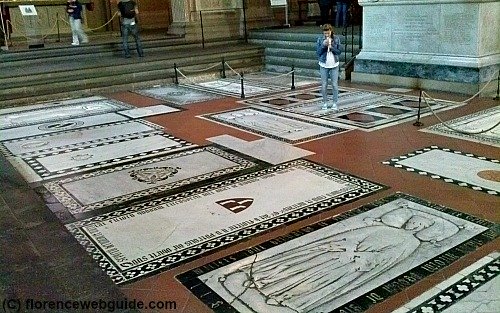 The church is covered in floor tombs