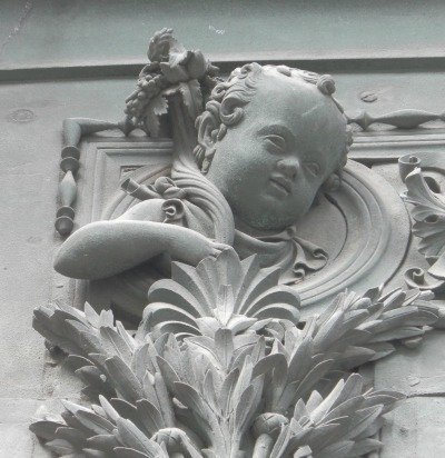 Cherub on frame of Pisano door