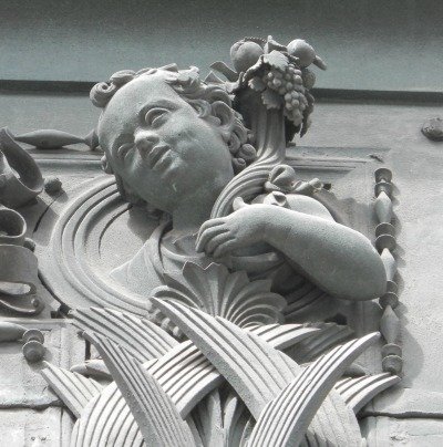 Cherub on frame of Pisano door