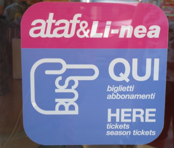 Sign letting you know that this establishment sells bus tickets