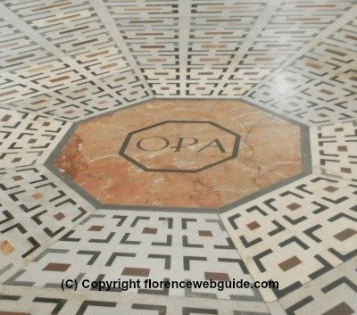 OPA - the organization in charge of the building and maintaining of the church - written in a marble tile in the floor of the basilica