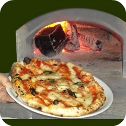 Florence Restaurants - Pizza Places - pizza coming out of wood fired brick oven