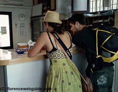 Visitors to Florence checking in at the hostel