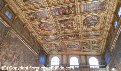 a shot of the many painted panels covering the ceiling of Palazzo Vecchio