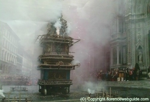 The Cart's fireworks go off in front of the Duomo