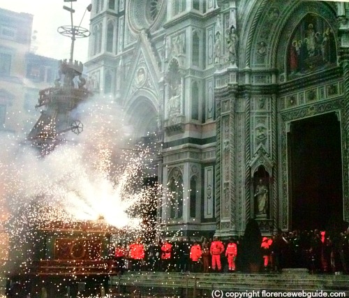 The centuries old cart 'explodes' in a pyrotechnic display in piazza Duomo