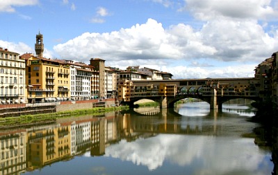 Classic lungarno view of river and Ponte Vecchio